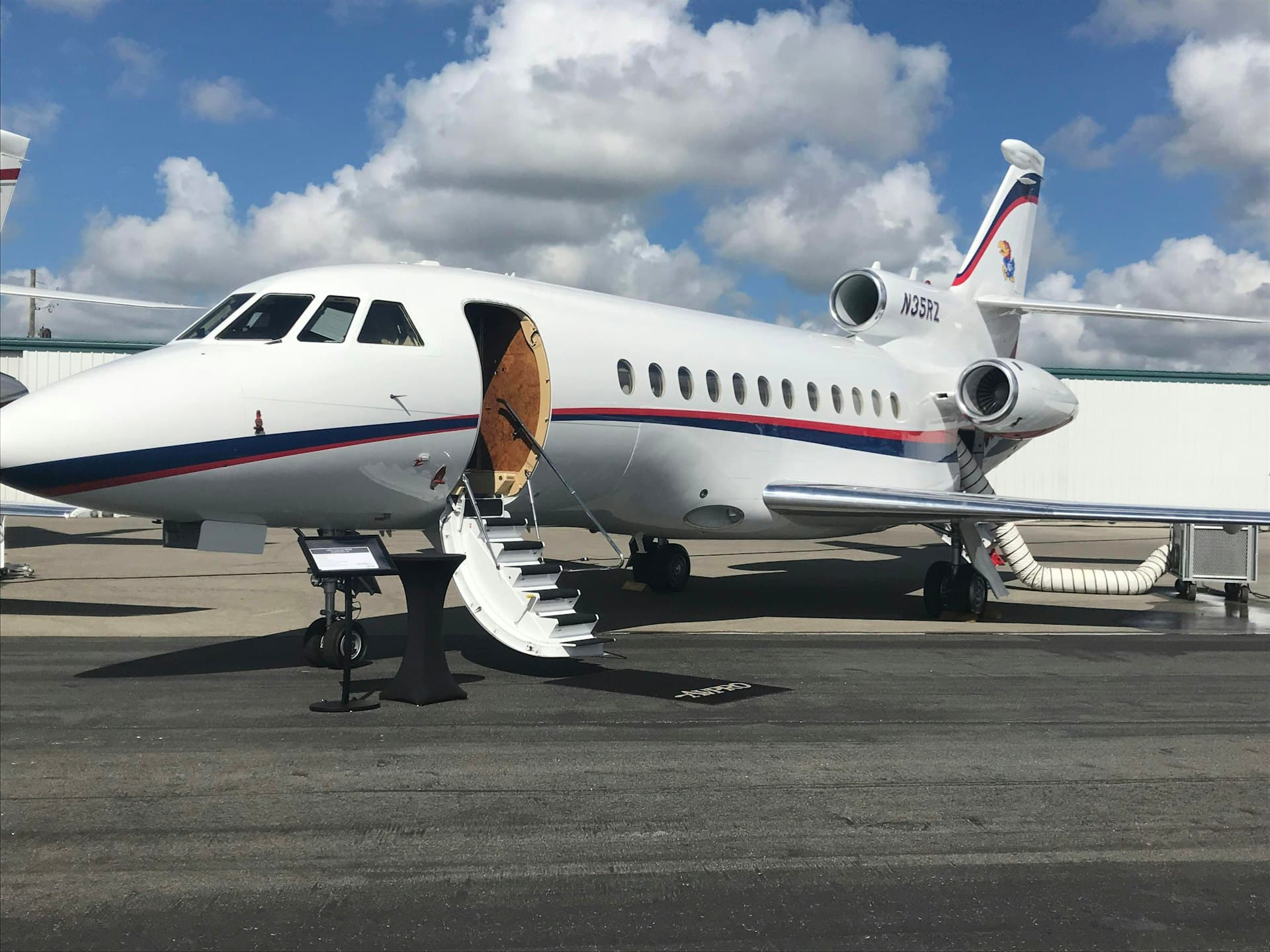 Private jet against blue sky representing fleet management